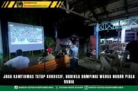 Jaga Kamtibmas Tetap Kondusif, Babinsa Dampingi Warga Nobar Piala Dunia